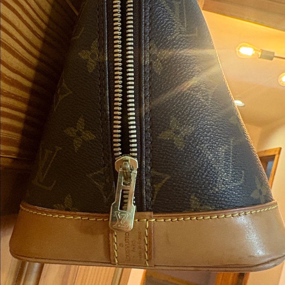 Louis Vuitton Alma PM Handbag - Picture 8 of 11